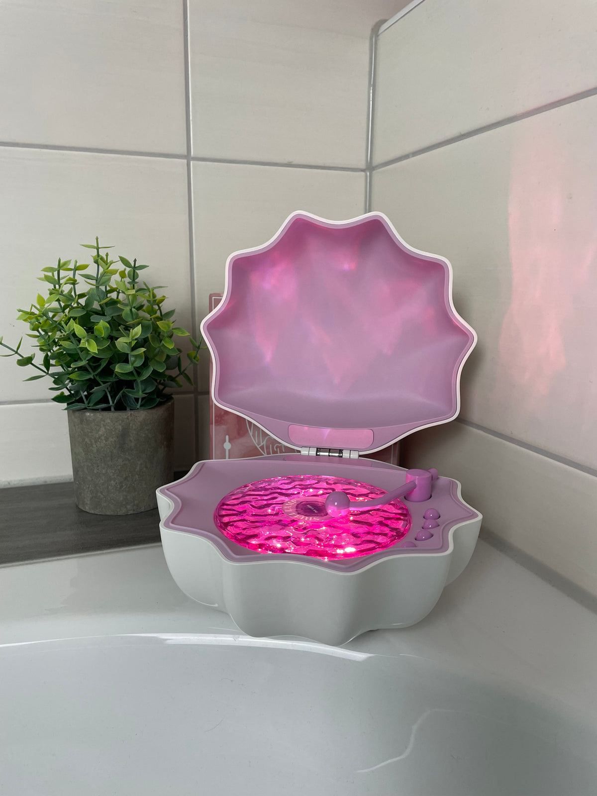 AquaShell™ | Color-Changing Ocean Wave Projector & Bluetooth Speaker