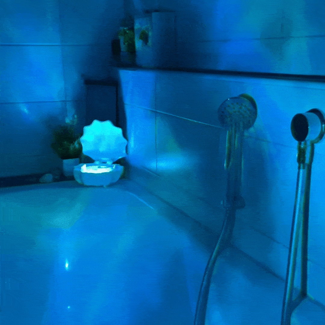 AquaShell™ | Color-Changing Ocean Wave Projector & Bluetooth Speaker